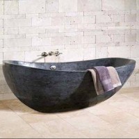 Ancient wood black marble stone bath tub